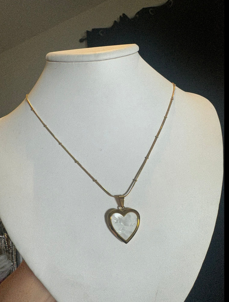 
                  
                    Shell Heart Locket Necklace
                  
                