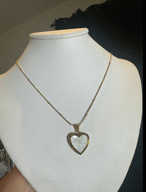 
                  
                    Shell Heart Locket Necklace
                  
                