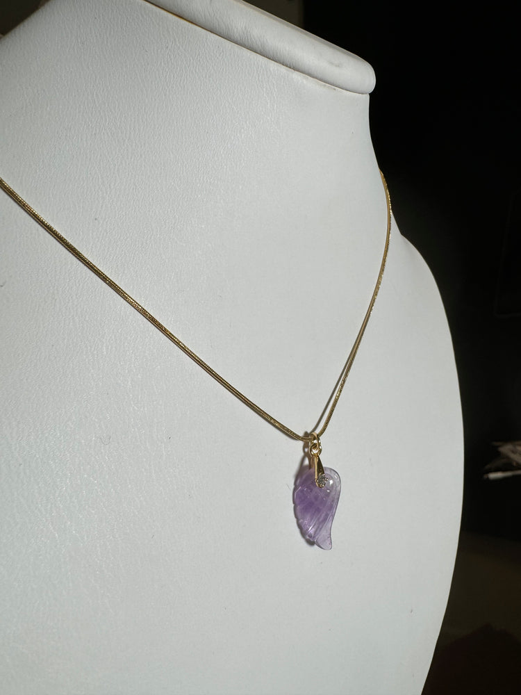 
                  
                    Amethyst wing necklace ￼
                  
                
