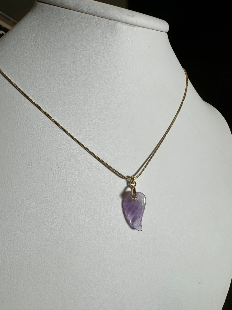
                  
                    Amethyst wing necklace ￼
                  
                
