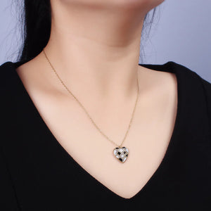 
                  
                    Black White Enamel Heart Necklace
                  
                