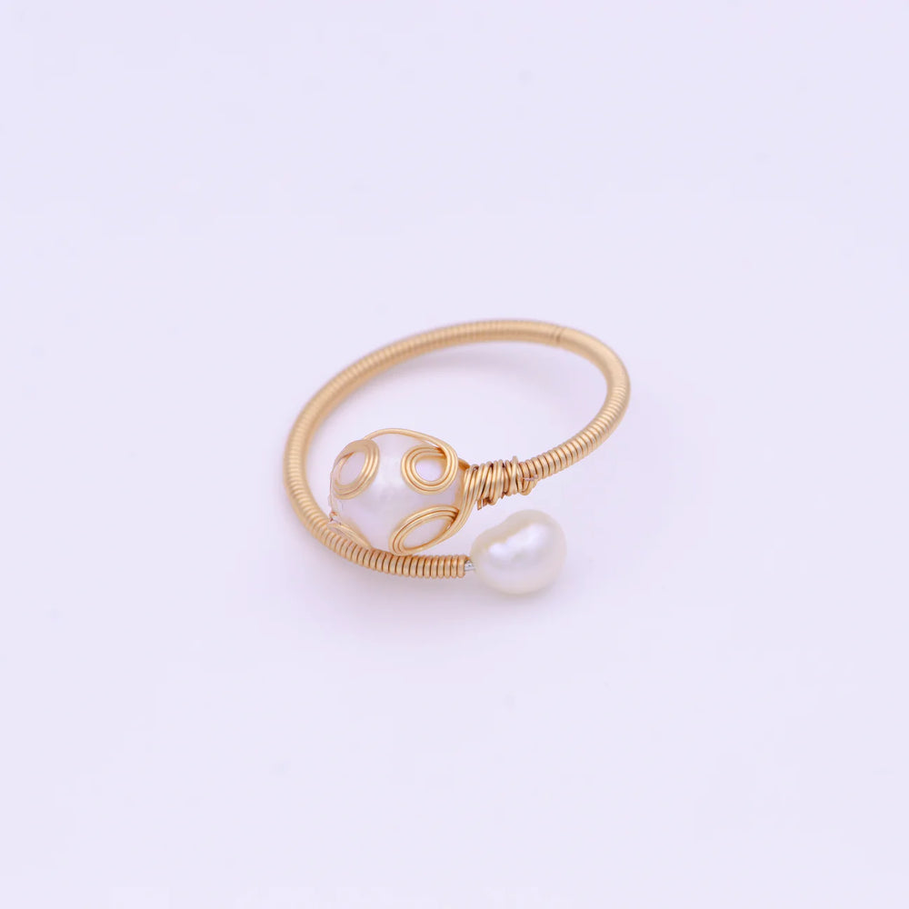 
                  
                    Double pearl ring
                  
                