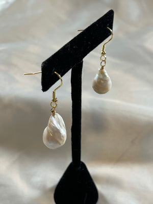 
                  
                    Melted Pearl Earring
                  
                
