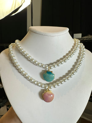 
                  
                    Shell Pearl Necklace
                  
                